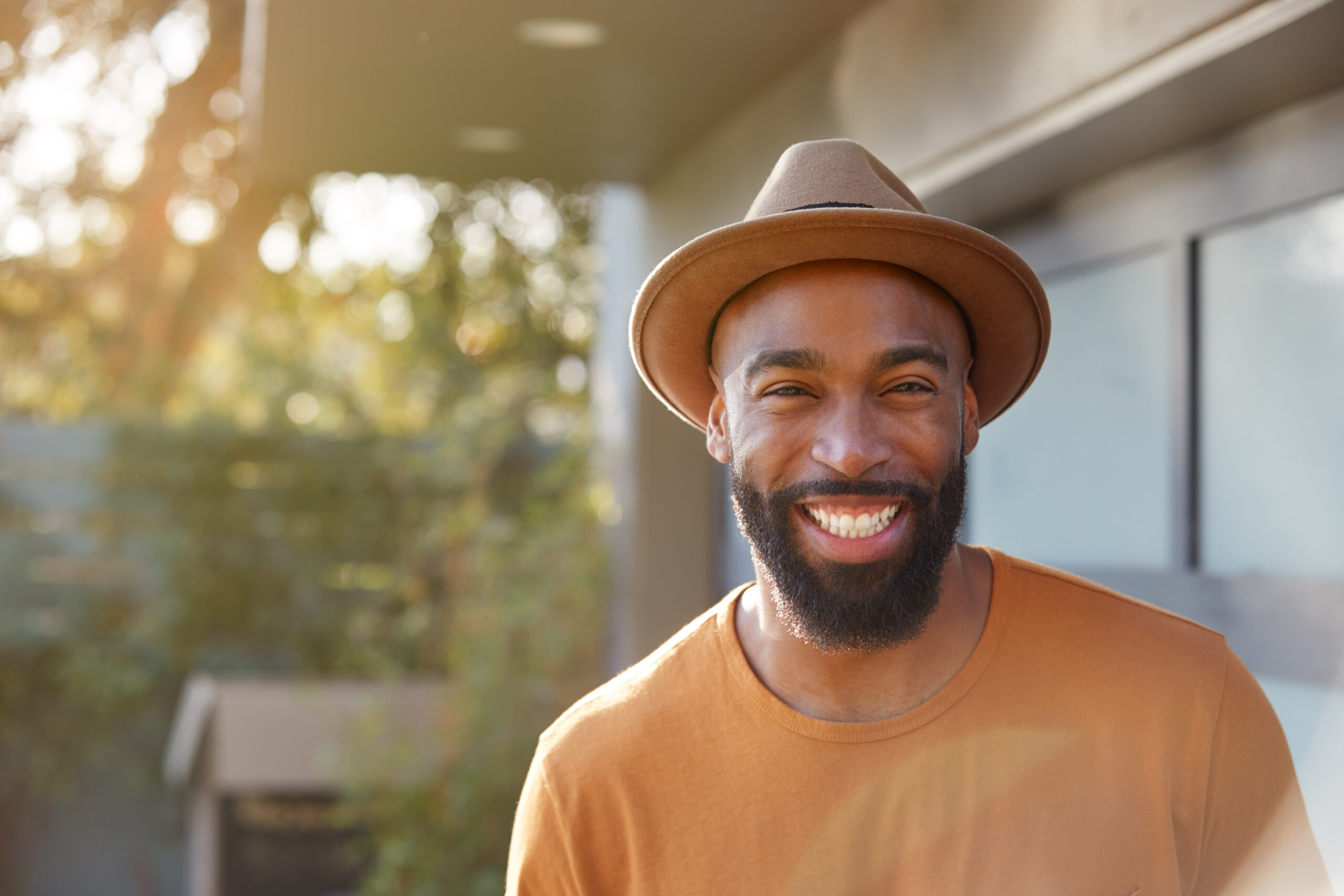 portrait of smiling african american man wearing h 2021 08 28 20 16 58 utc scaled