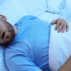 man snoring while sleeping